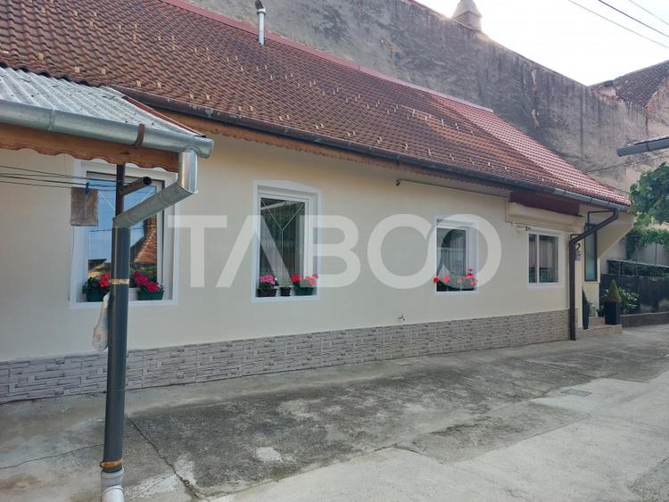 Casa 109 mp 4 camere pivnita terasa loc parcare curte comuna Cisnadie