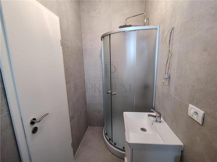 Duplex despartit prin camera tehnica - 2 dormitoare - 2 bai - zona foarte buna -