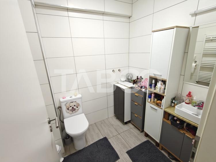 Apartament decomantat 3 camere 2 bai 70 mp utili cu parcare subterana