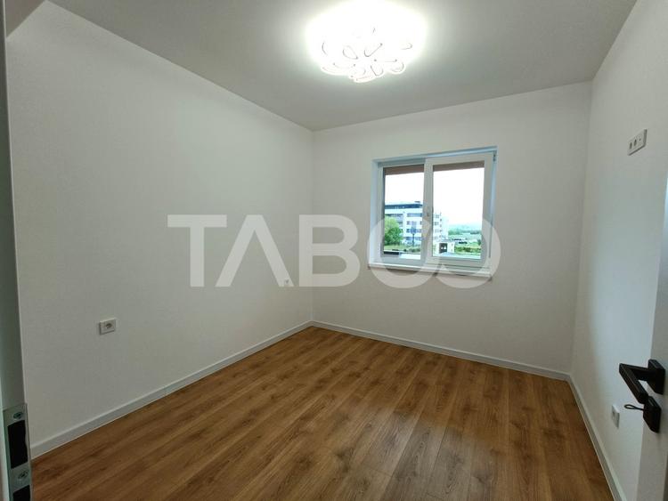 Apartament spatios 3 camere 2 bai - incalzire pardosea - parcare