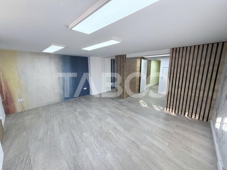 Cladire de birouri cu spatiu comercial la parter si 6 locuri parcare