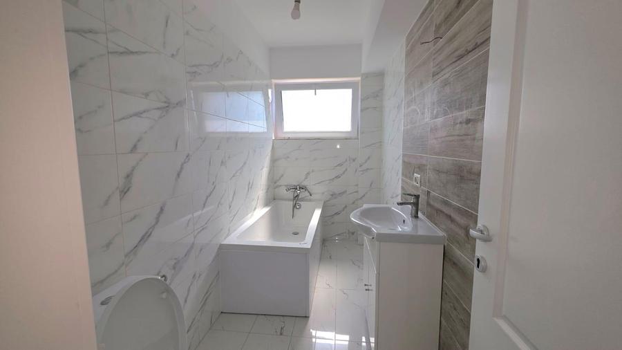 Apartament 2 camere decomandat și cu GRĂDINĂ proprie, finisat complet