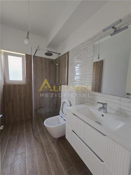 Vila tip duplex - 4 camere - 2 bai - pod - beci