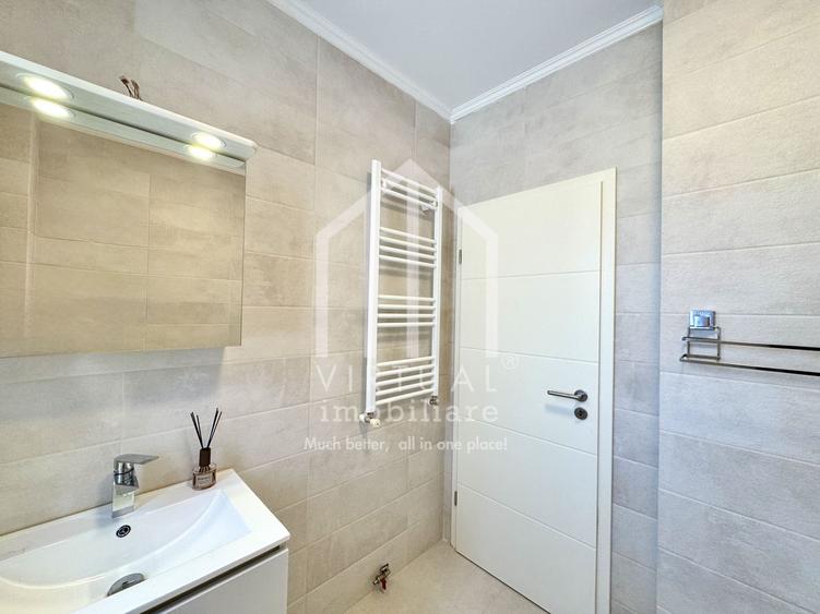 Apartament cu 2 camere, 60mp utili, baie cu geam, parcare privata