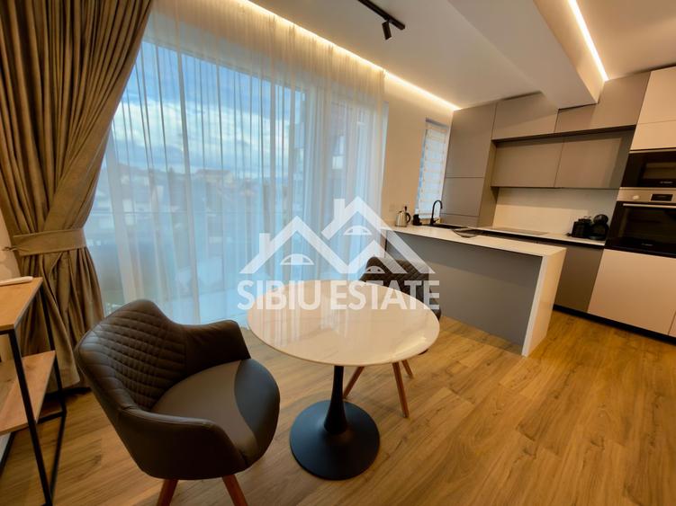 Apartament central finisare premium parcare subterana imobil nou
