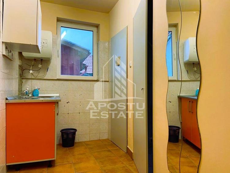 Casa +Spatiu comercial + apartament studio