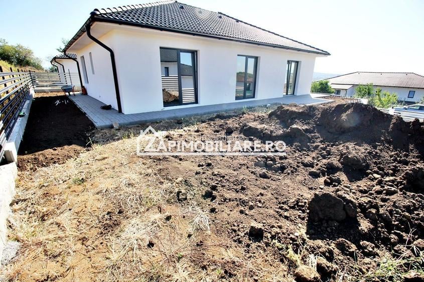 Casa pe 1 nivel,4 camere,2 bai,110 mp.1 dressing,500mp teren - 12