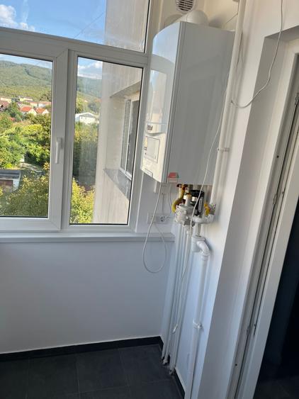 Apartament 2 camere 50mp Bradet ultrafinisat+garaj sub bloc
