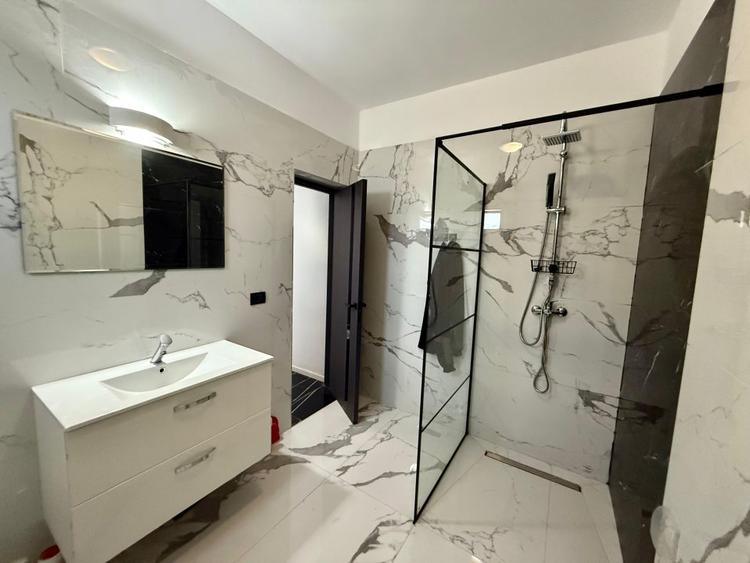 Vilă de vânzare cu design deosebit în cartierul Bucium