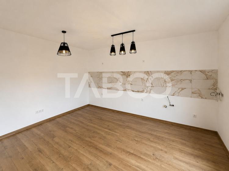 Duplex pe un singur nivel 3 camere 2 bai 235 mp teren in Talmaciu