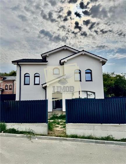Casa individuala 120 mp utili cu 4 camere 2 bai mp si teren 264 mp