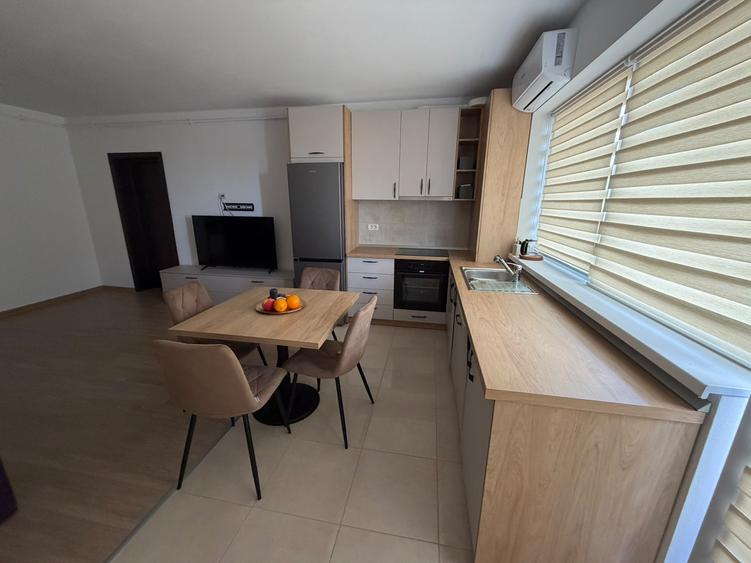 URGENT.Apartament doua camere mobilat si utilat, daua televizoare si parcare