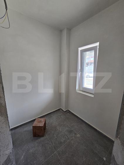 Apartament spatios 68mp, 3 camere, garaj si gradina mare 90mp