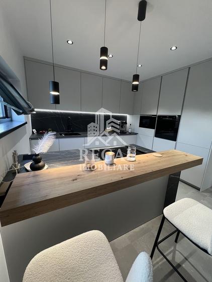 Casă modernă tip duplex, ideală pentru 2 familii – in loc. Strei