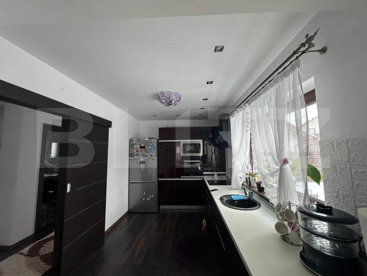 Casă individuală cu grădină generoasă | 4 camere, 112 mp utili, teren 500 mp
