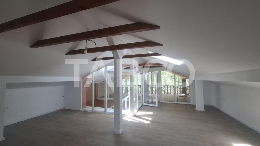 Casa de vanzare 405 mp utili 2 garaje 250 mp terase Slimnic Sibiu