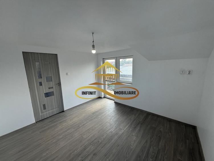 Casa de vanzare in Bacau Saucesti spatioasă cu etaj separat