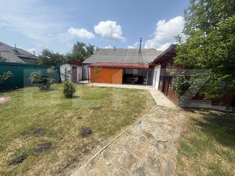 Casă spațioasă, 294 mp, 1.692 mp teren, garaj, terasă și grădină – Voinești