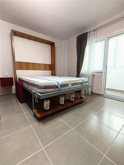 Garsoniera confort 1 sporit decomandata Unirii Optimed