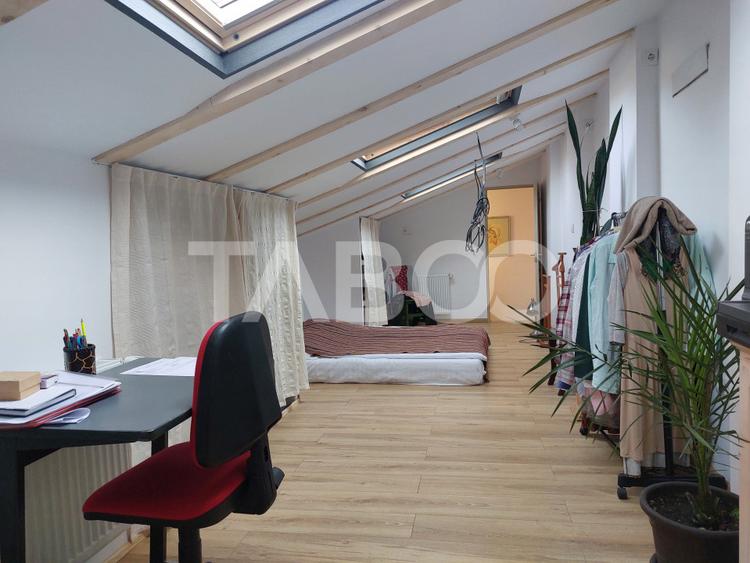 Apartament de vanzare 105 mp 3 camere curte 340 mp in acte Cisnadie