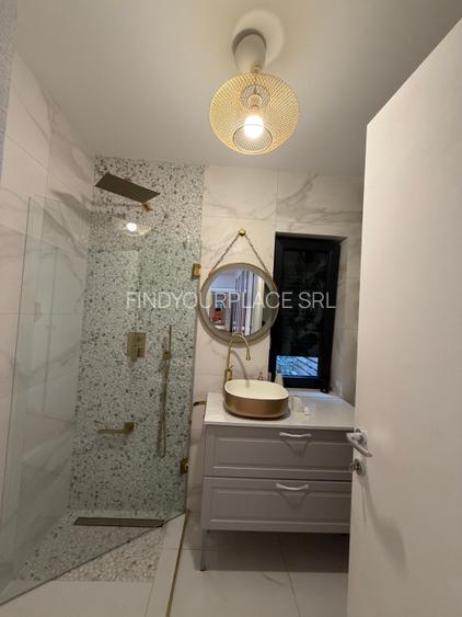 Apartament în Arcadia Domenii,230mp curte,3 parcări incluse