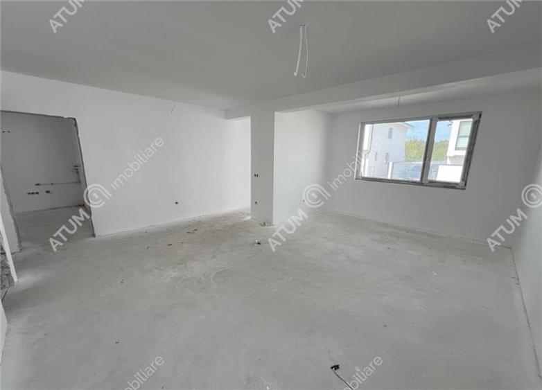 Casa cu 4 camere 2 bai curte de 50 mp zona Calea Cisnadiei Sibiu