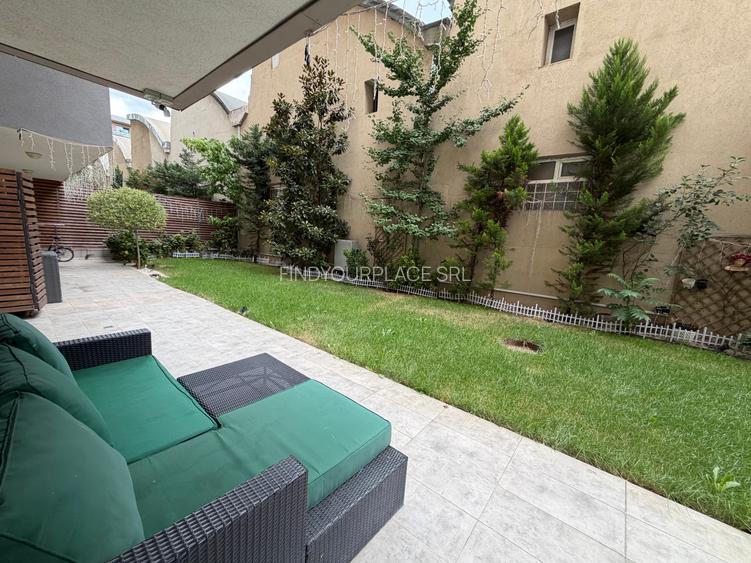 Apartament în Arcadia Domenii,230mp curte,3 parcări incluse