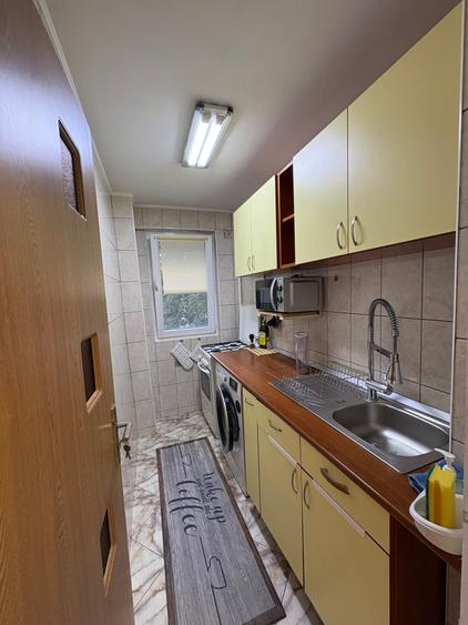 Berceni,ap. 2 camere,42mp,et.2,renovat recent,loc parcare inclus,420Euro/luna
