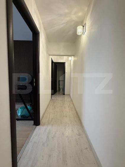 Apartament 3 camere, 2 bai, decomandat, etaj intermediar, boxa