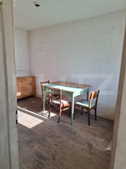 Vânzare Casă în Săcele - Locuință cu Teren Generos cu Potențial -de Renovat