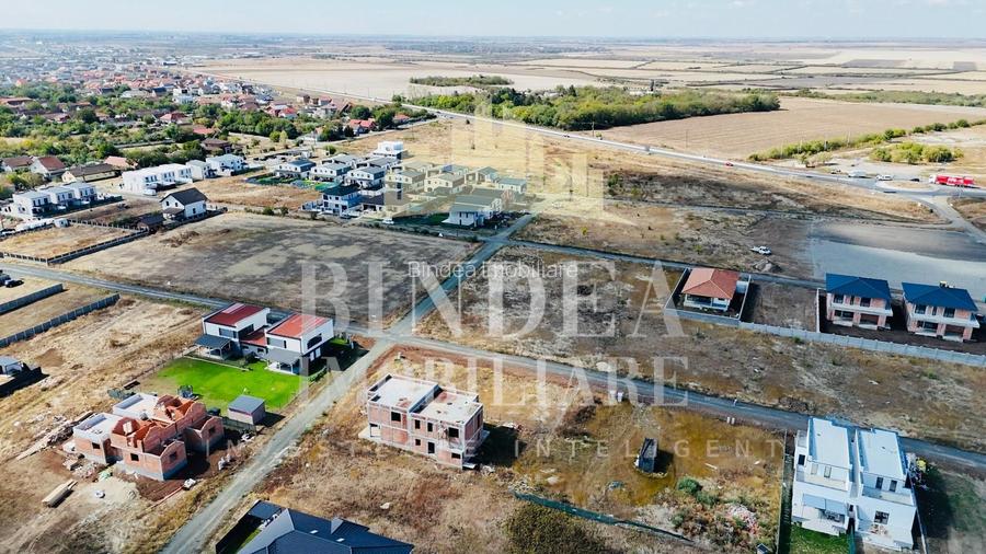 Teren intravilan 703mp pe colt cu doua fronturi generoase Giarmta