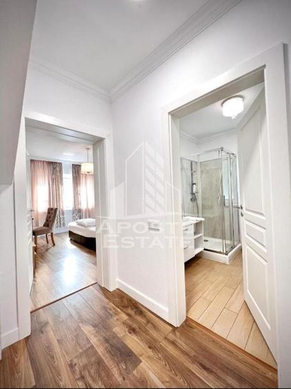 Cladire cu 4 apartamente si sala de evenimente ptr 60 persoane