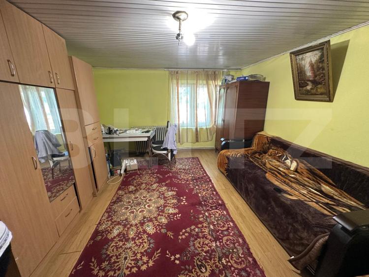 Casă de vânzare, 76 mp utili, teren 1.500 mp, vedere panoramică, zona Bucium