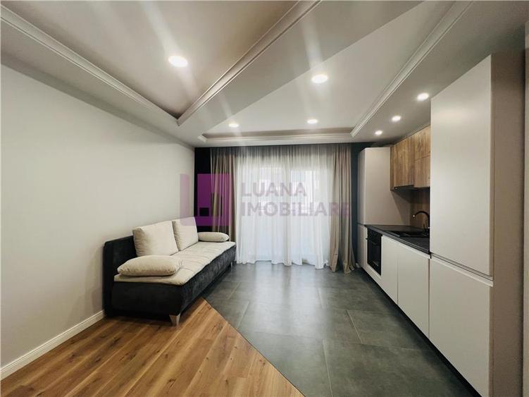 Apartament o camera de vanzare | parcare privata | gradina | mobilat si utilat |