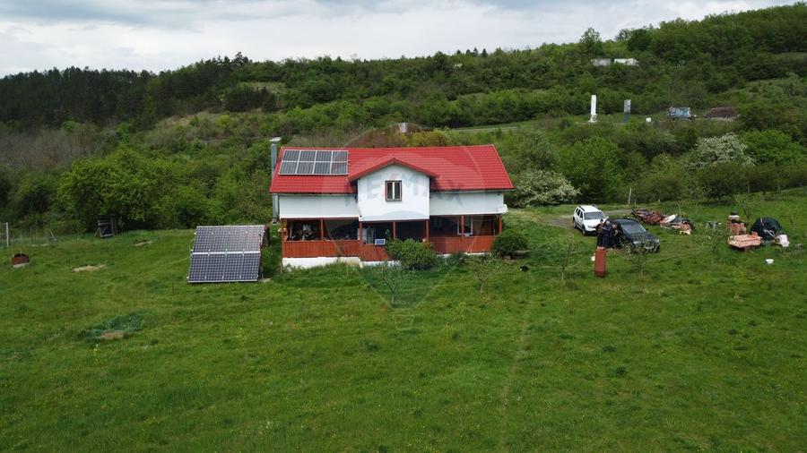 Proprietate OFF-GRID 5,76 Ha. Casa tradiționala lemn. Limită Cluj