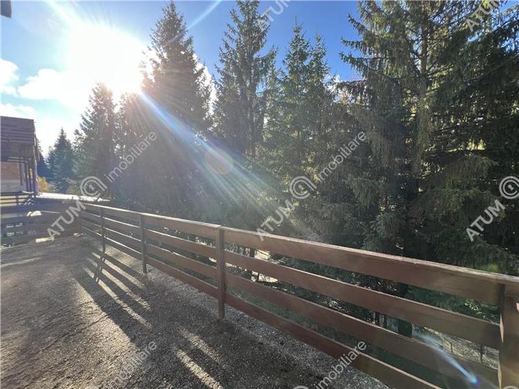 Pensiune de 7 camere cu 5 bai si teren de 377mp situata in Paltinis