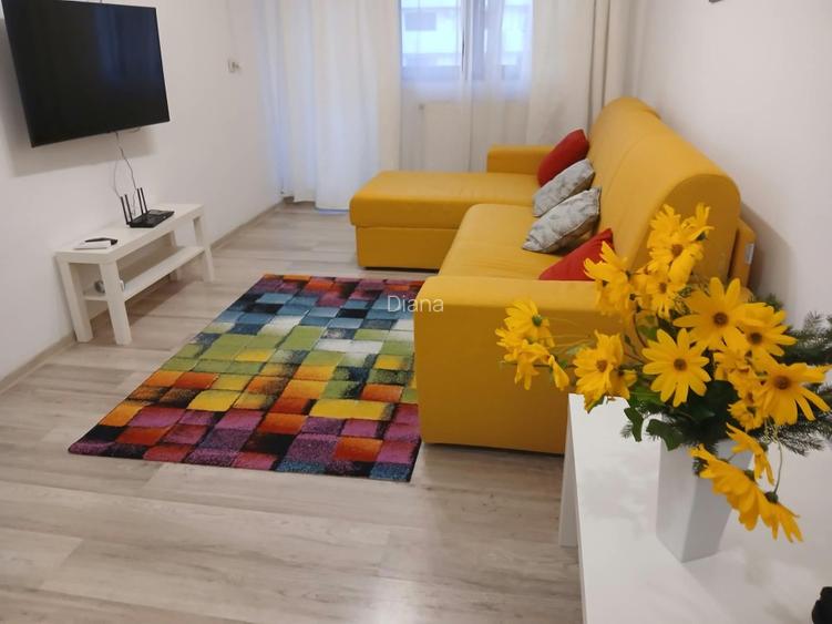 Un apartament cochet, cu parcare proprie, aproape de parcuri si birouri