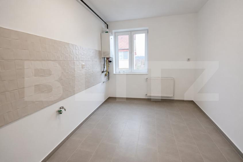 Apartament 3 camere,2 balcoane,pod,pivnita,parcare,etaj 2,zona Joagar