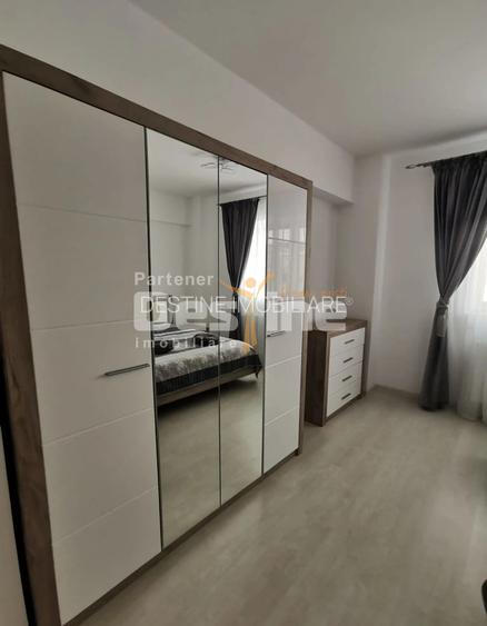 Apartament cu 2 camere 50 mp,  cu loc  de  parcare  inclus,  situat in Tractorul - 4
