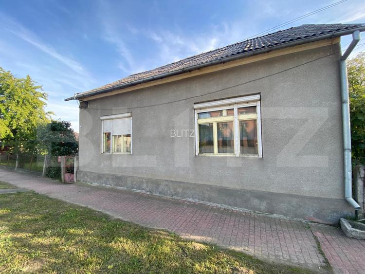 Casă cu teren 10 ari, 2 anexe și dublu front stradal – Beclean