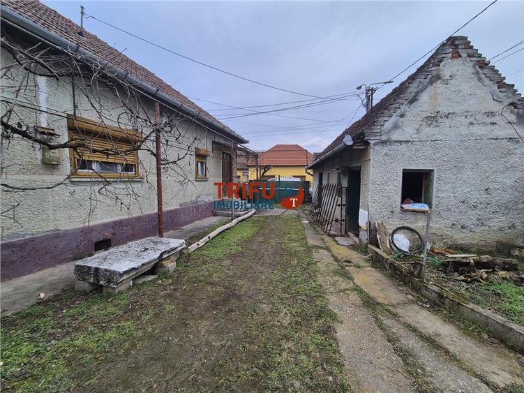 Casa in cartierul Barabant 1651mp teren, multiple posibilitati