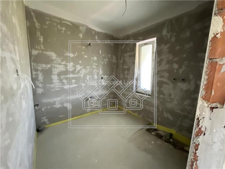 Casa de vanzare in Sibiu - 4 camere - 3 bai - teren 600 mp - 29