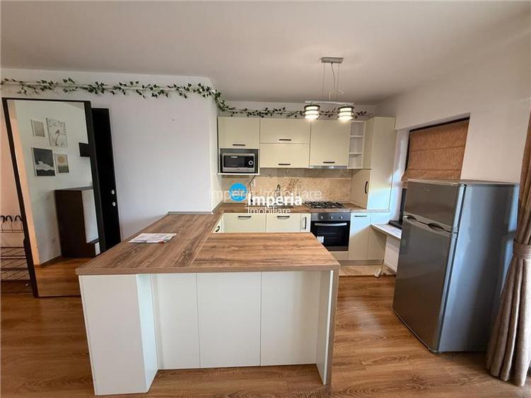 Inchiriez apartament 2 camere, open space,parcare, Complex Roua Residence