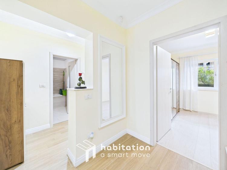 Apartament spațios cu curte și garaj – confortul unei case moderne