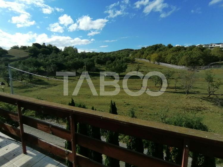 Pensiune 13 camere 16 bai sauna piscina si teren 1565 mp Cisnadioara