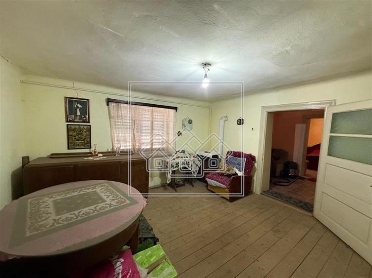 Casa 3 camere in Slimnic - Curte 460 mp, pivnita si pod