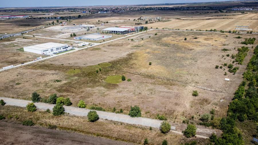 Vând parcele teren cu PUZ industrial DN 69 la limita Timisoara-Sanandrei,