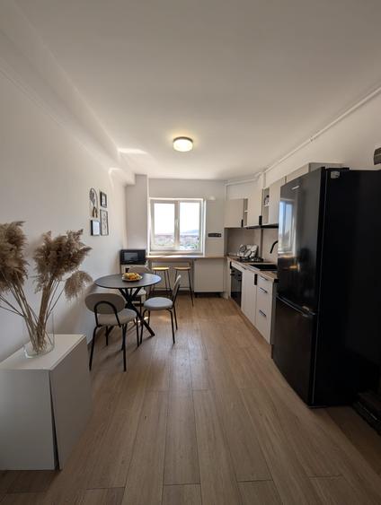 Apartament cu o camera si parcare, zona Primariei Floresti