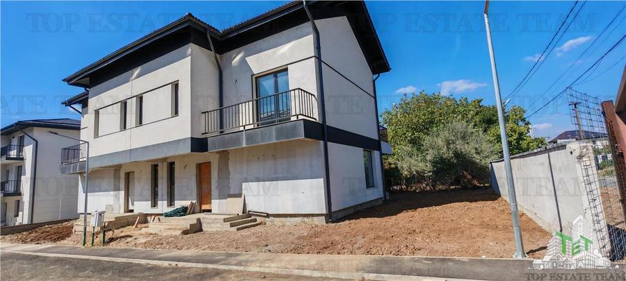 Vila individuala cuplata, in complex rezidential modern, cu 5 camere si mansarda