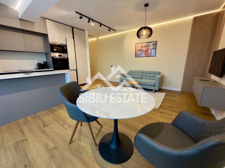 Apartament central finisare premium parcare subterana imobil nou